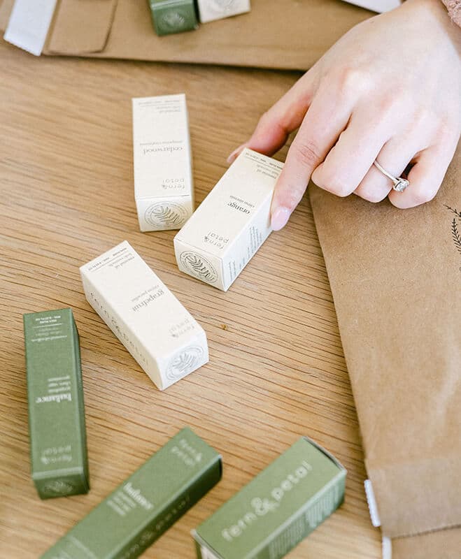 A person choosing an essential oil